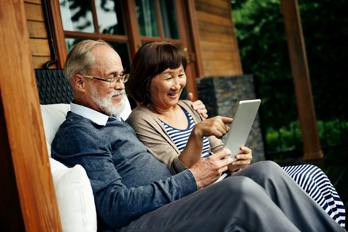 Couple looking at tablet together