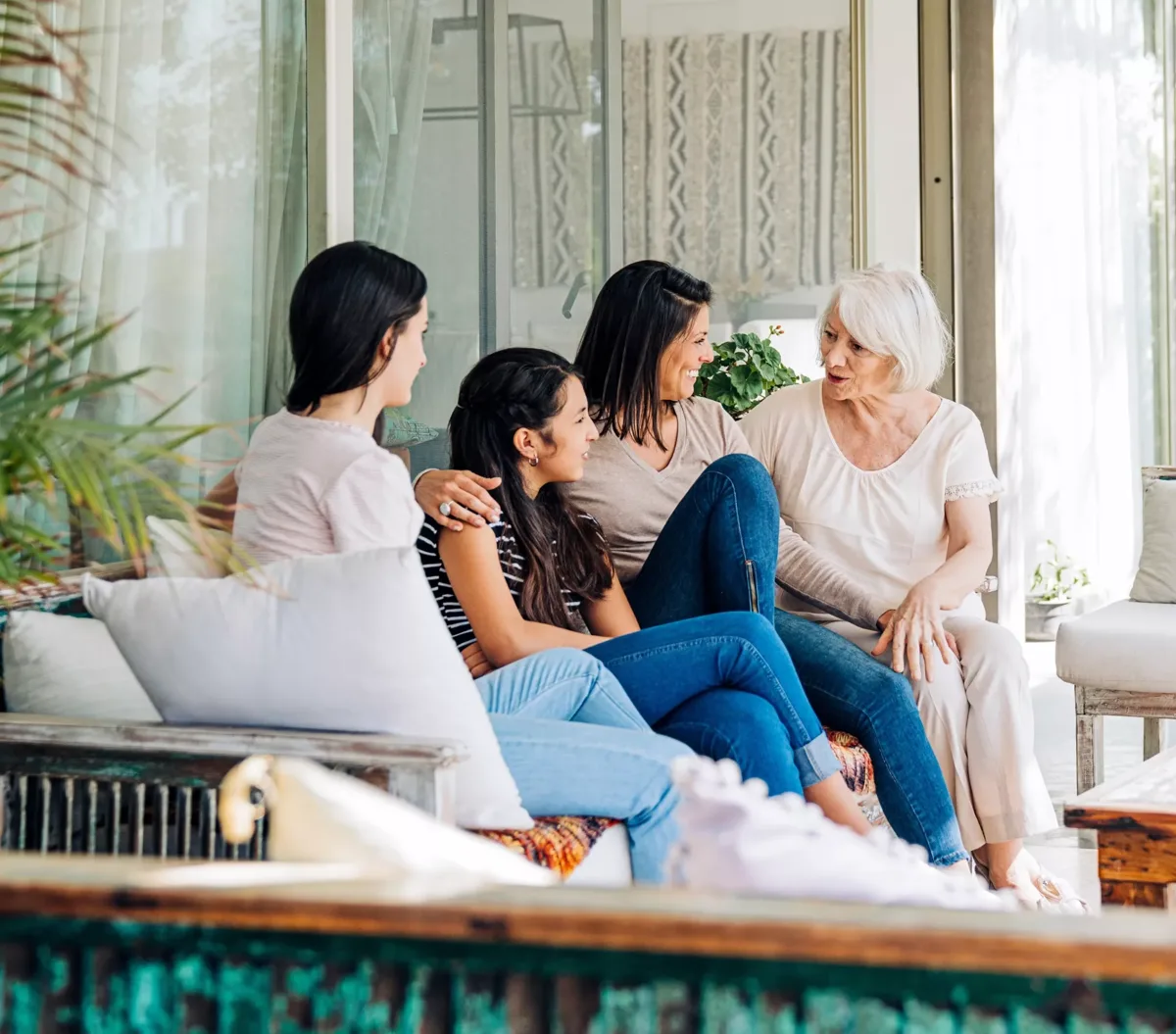 Multi-generational family sitting together